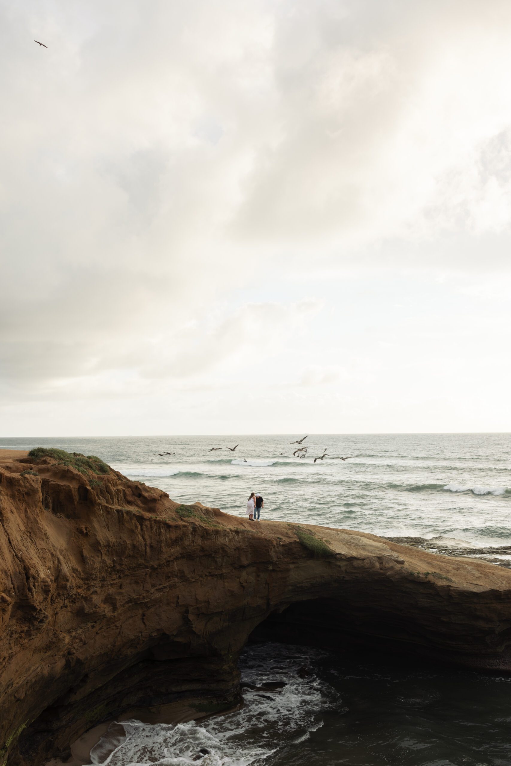 Couple embracing at Sunset Cliffs
