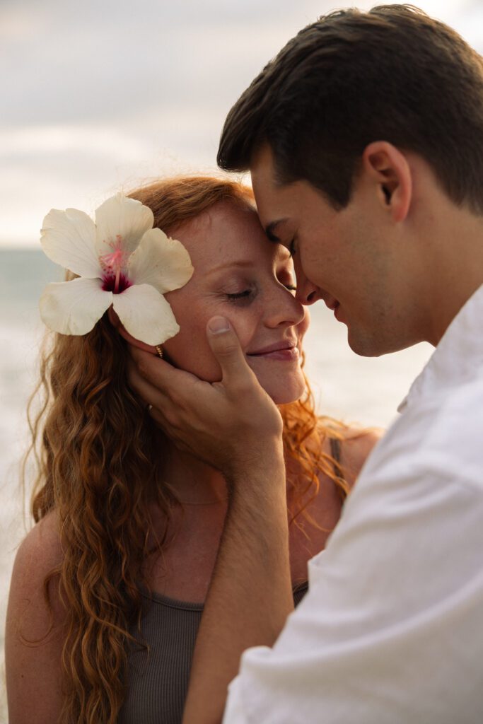 hibiscus flower in hair for maternity photos