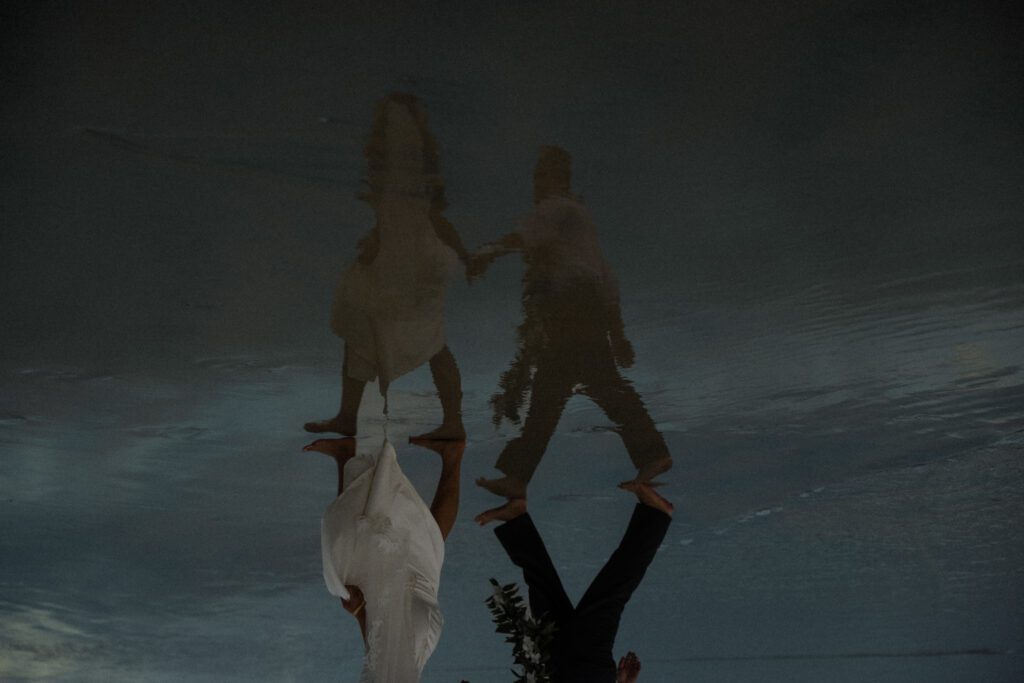 blue hour elopement photos reflection shot in water