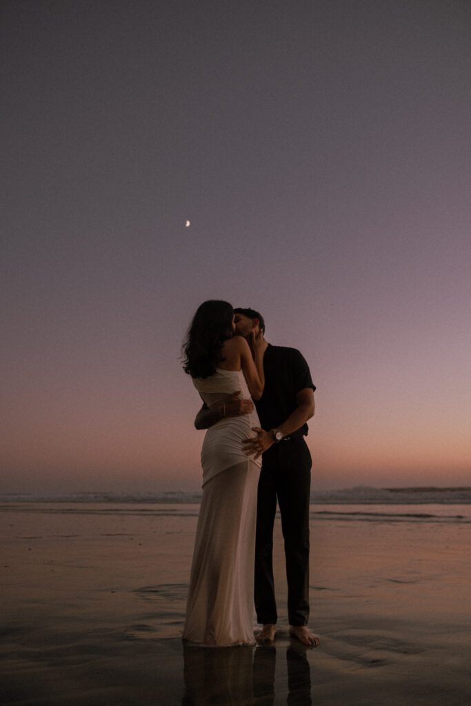 Engagement photos on the beach in Carlsbad during blue hour 