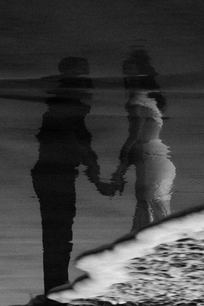 Engagement photos on the beach in Carlsbad during blue hour in black and white