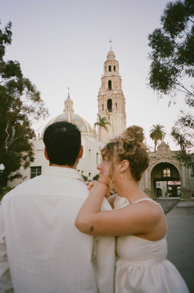couples film photos at balboa park