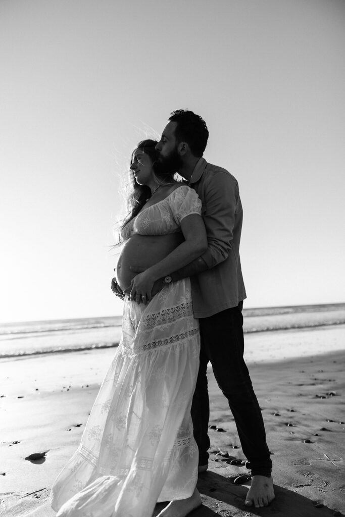 southern california maternity photos on the beach in black and white