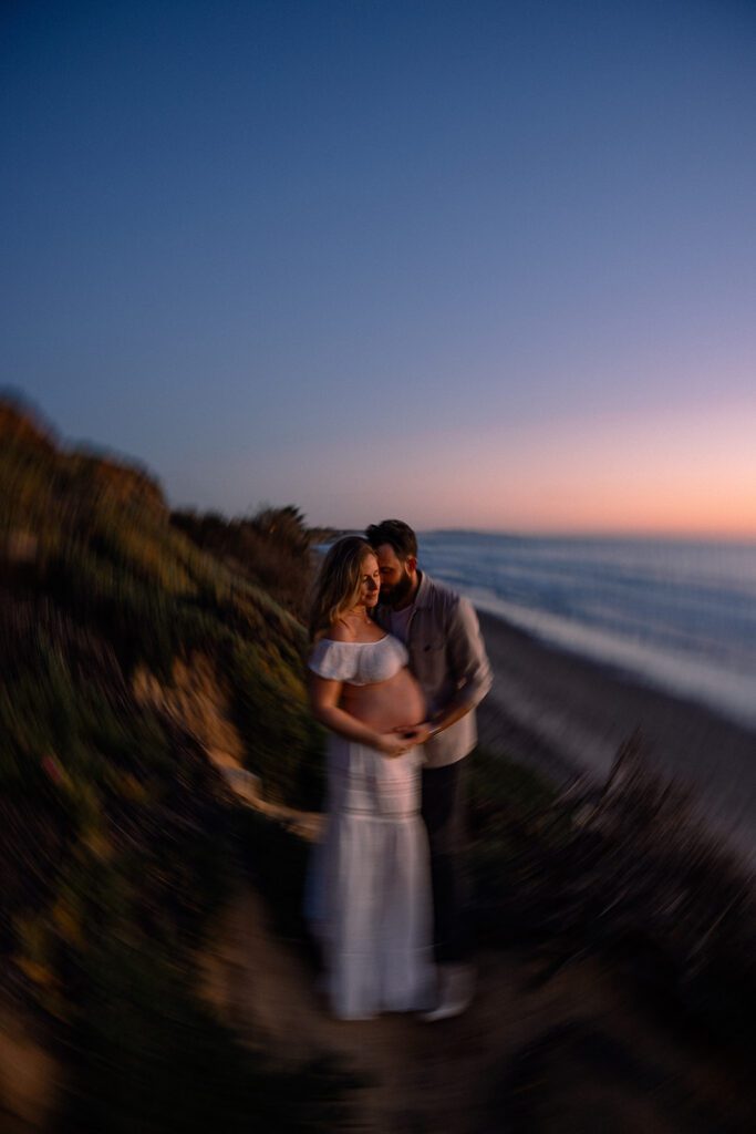 cinematic maternity photos on the the cliffs