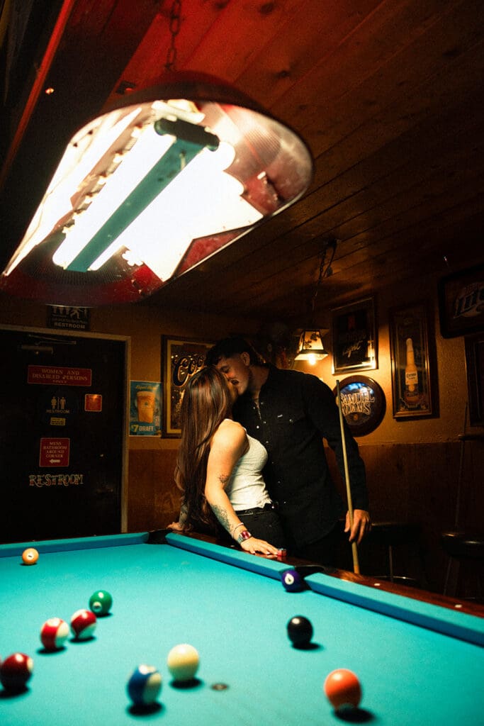 Stagecoach Inn engagement photos with pool table