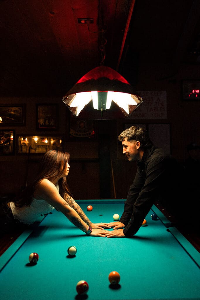 Stagecoach Inn engagement photos with pool table