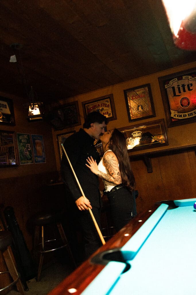 Stagecoach Inn engagement photos with pool table