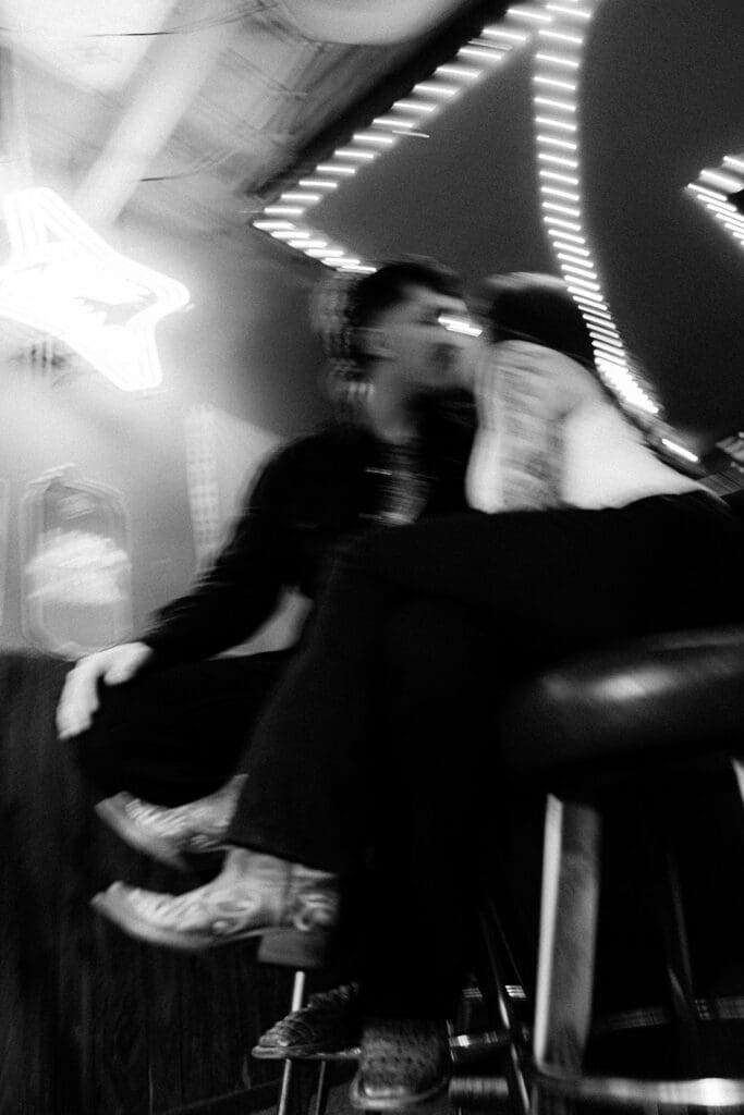 black and white san diego engagement photo playing pool