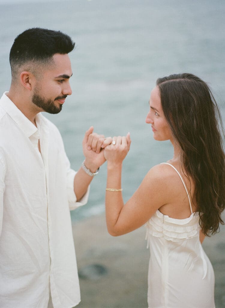 film engagement photos of couple at sunset cliffs in san diego, ca