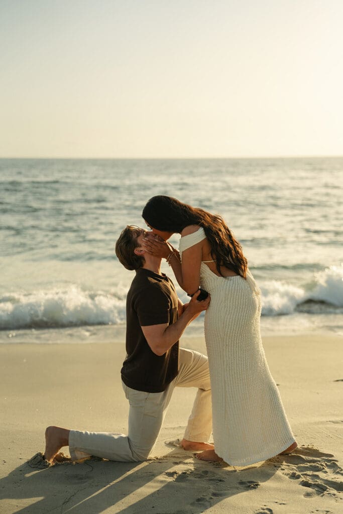 Surprise proposal at Windansea Beach with ocean views and coastal cliffs