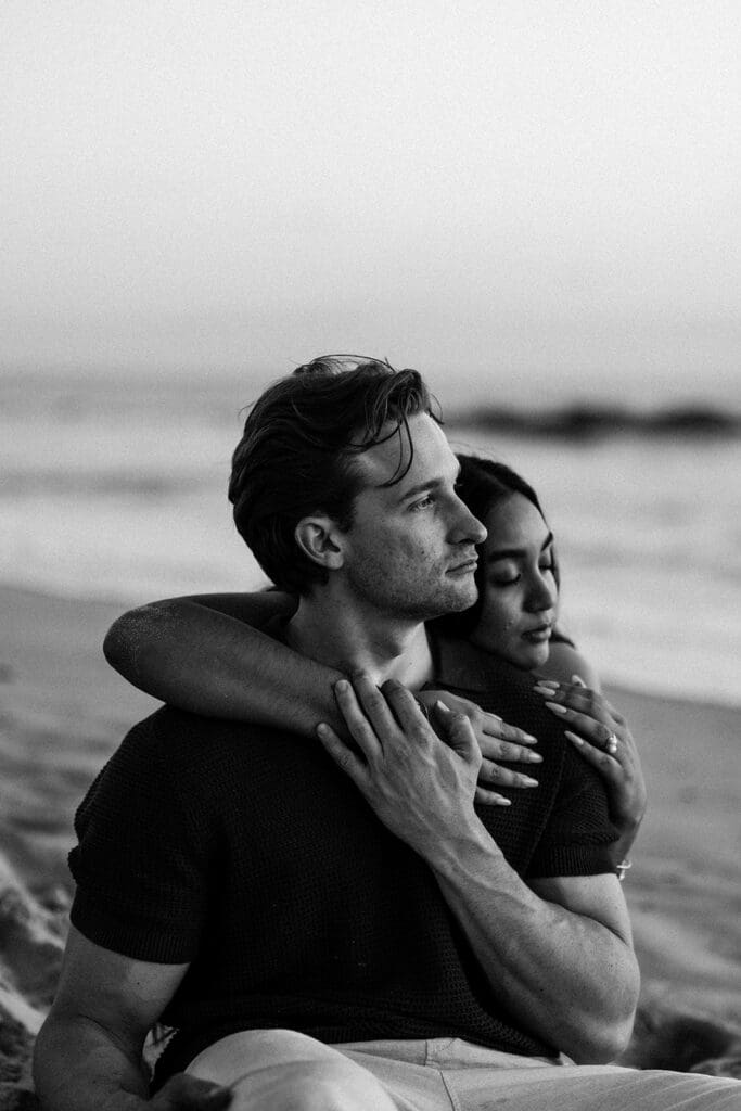 Romantic silhouette of engaged couple during blue hour