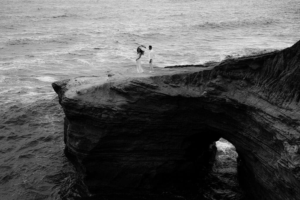 black and white photo from Cloudy Sunset Cliffs Engagement Session