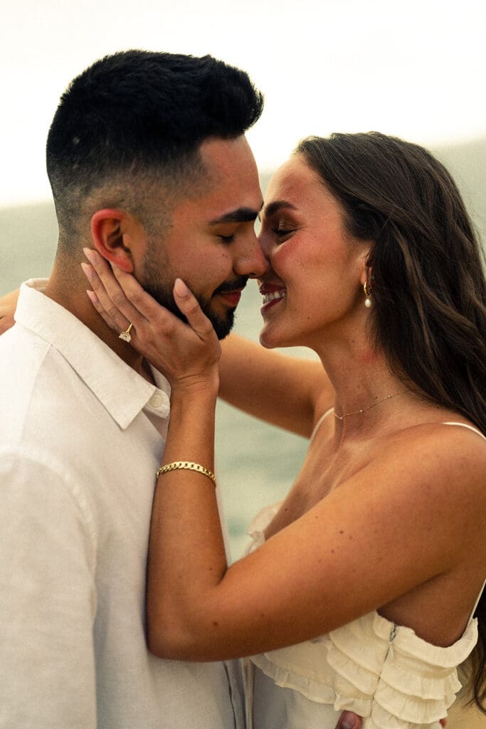 cinematic couples photos from a Cloudy Sunset Cliffs Engagement Session