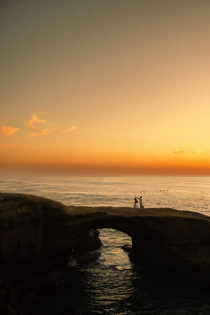 If you want dramatic coastal scenery, it is hard to beat Sunset Cliffs. The rugged sandstone cliffs, crashing Pacific waves, and expansive ocean views create an unforgettable backdrop for a San Diego proposal.